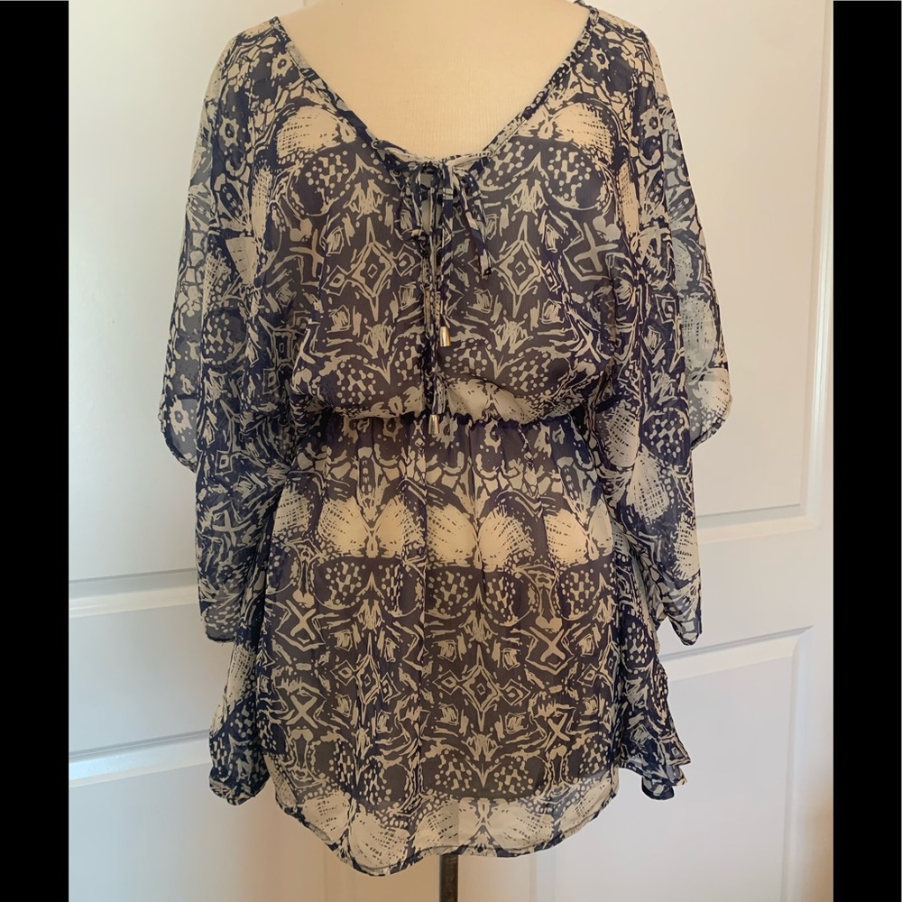 Pure Sugar sheer bat winged top